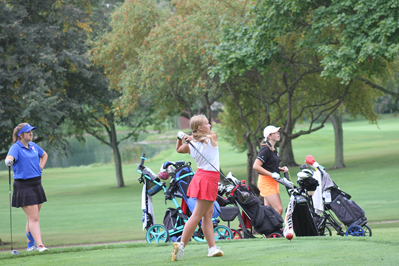 Huntley senior Aubrey Dingbaum hits a tee shot at the Fox Valley Conference meet.