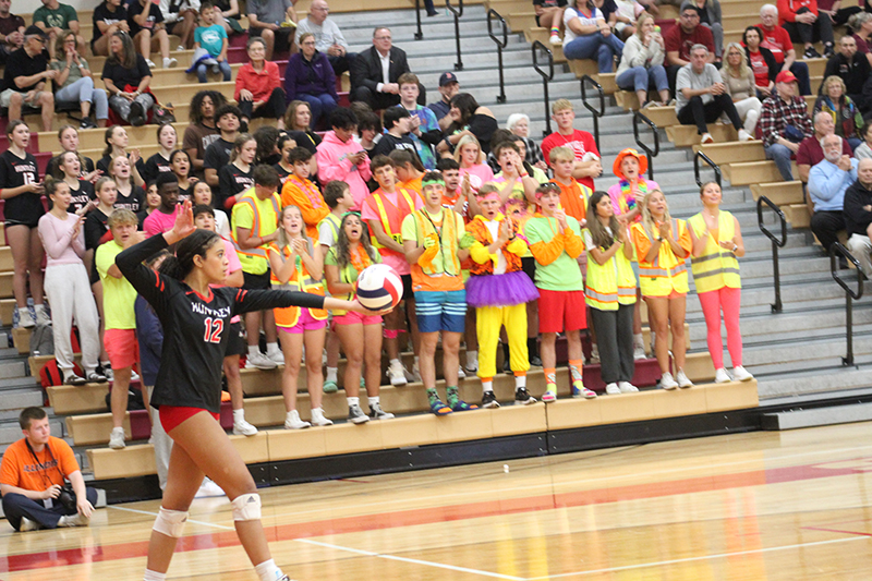 Huntley senior Morgan Jones concentrates prior to a serve.