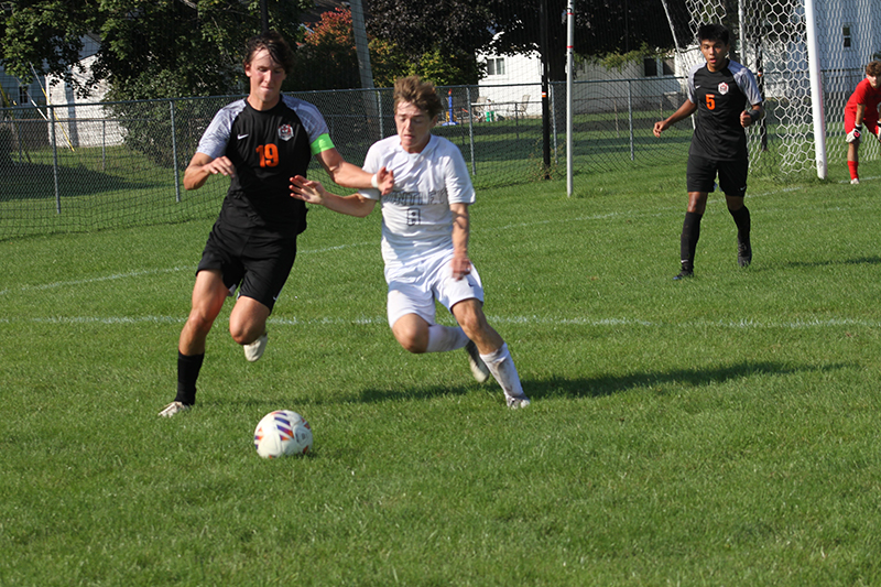 Huntley senior Gavin Eagan, right, battles a Crystal Lake Central player for ball control Sept. 30.