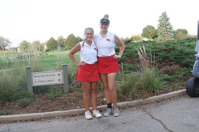 Huntley senior Aubrey Dingbaum, left and junior Maddie Sloan competed at the Class 2A Sectional meet Oct. 2 at Whisper Creek Golf Course.