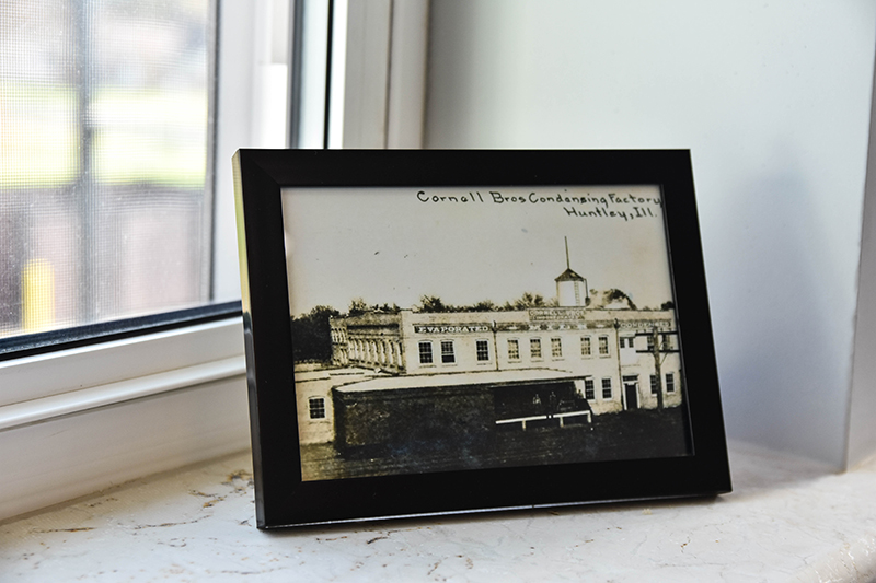 Inside the Cornell, located at 11117 S. Church St. are old and historic photos of what was once the Cornell Bros Condensation Factory placed all over the apartment building's windows and hallways for residents and guests to learn more about what the building once was.