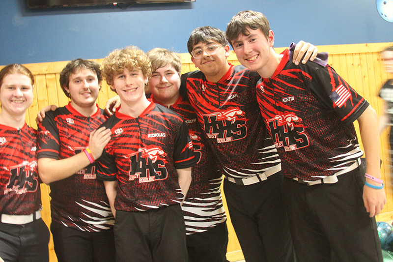 Huntley bowling team members congratulate teammate Nicholas Gaspari for his 300 perfect game score Dec. 6. From left: Landon Conforti, Matt Fishman, Gaspari, Joey Humphrey, Noah Waters and Austin Tenglin