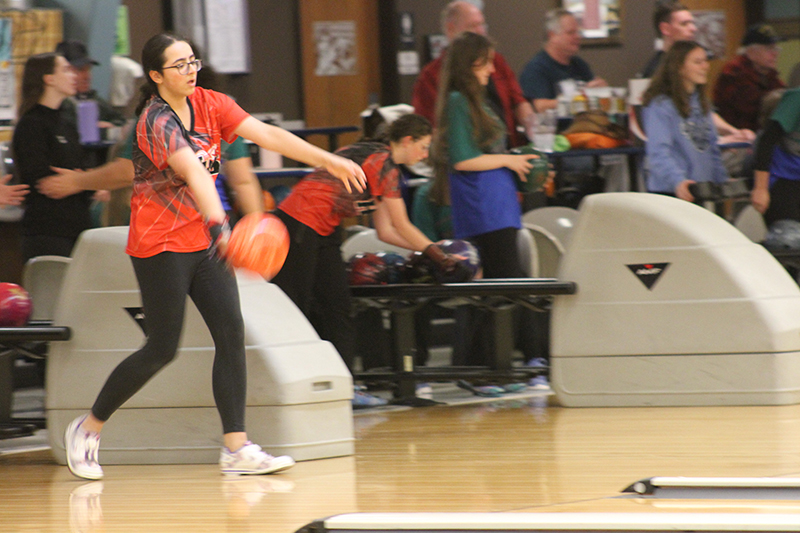 Prianca Waters concentrates before throwing the ball in a Red Raiders recent match against Woodstock.