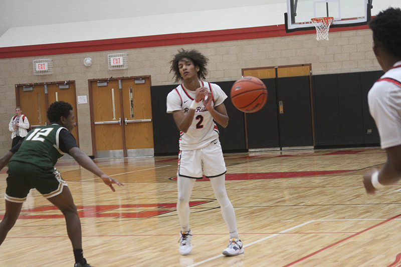 Omare Segarra passes the ball to a Red Raiders teammate in Huntley's clash with Stevenson.