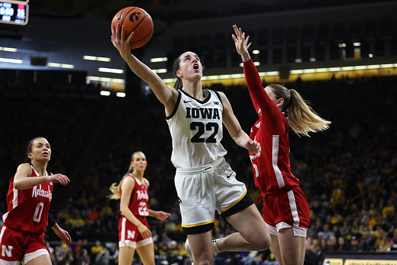 University of Iowa standout Caitlyn Clark heads for two points during a recent game against Nebraska