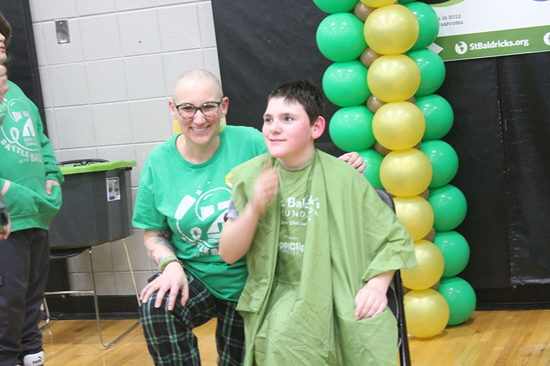 Jennifer Slad, left and Matt Erickson were two participants who had their head shaved at the St. Baldrick's Battle of the Bald event March 1 at Marlowe Middle School.