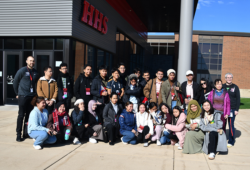 Exchange students from the Philippines, NIU, and Huntley High School staff.