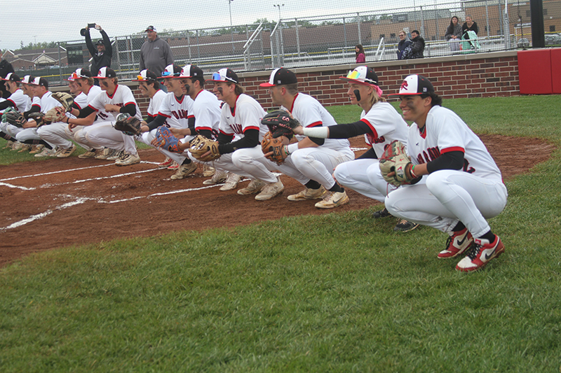 Huntley senior baseball players are ready to catch pitches thrown by their moms on senior day.