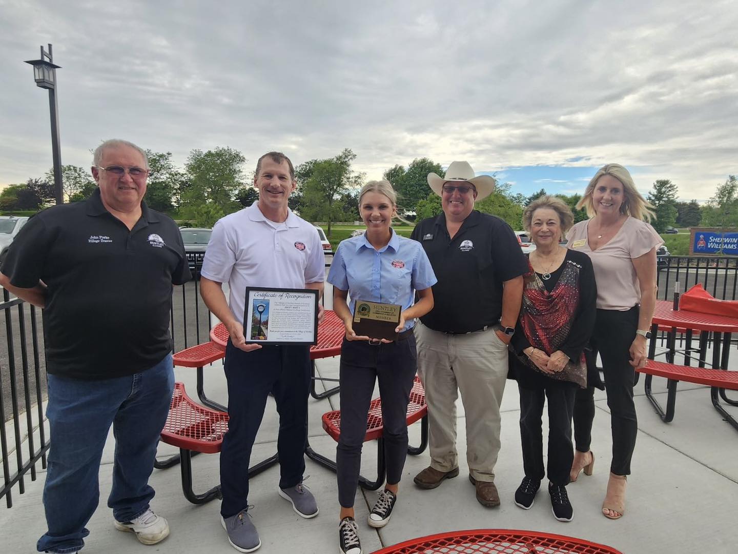 Jersey Mike's staff celebrated the restaurant's opening with Village and Chamber officials on May 20