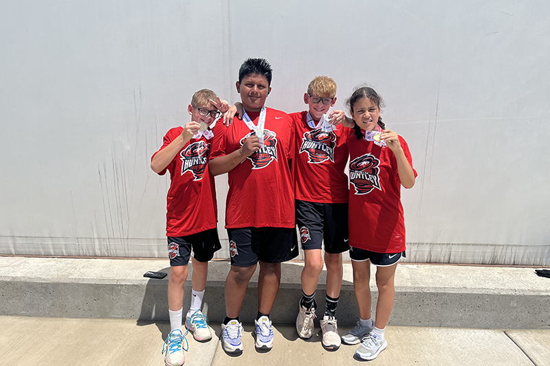 Four Huntley District 158 Hurricanes members competed at the Illinois Special Olympics at Illinois State University. From left: Parker Goering, Luis Martinez, Chase Goering and Gabi Ford.