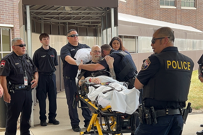 Kane County Forest Preserve District and Maple Park Police Officer Ed Lopez (Center) lost his battle to cancer on June 26