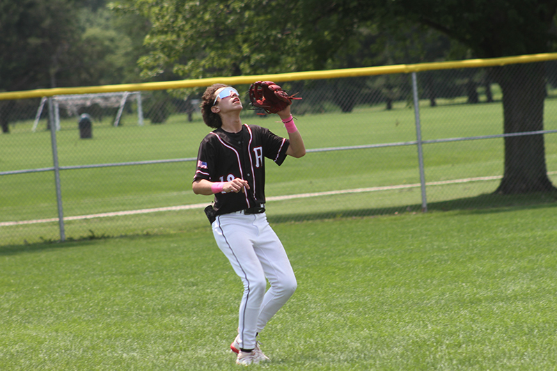 Mason Kuth of Red Raiders Academy 13U team readies to catch a fly ball in a McHenry County Youth Sports Association tournament game.