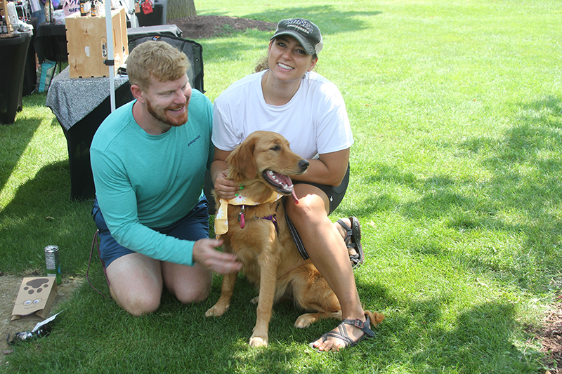 Ken and Nicohle Arvidson of Crystal Lake and their dog, Bernie, attend the Animal House Shelter's Pawfest event Aug. 3 at Deicke Park.