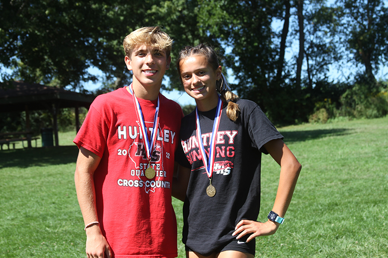 Huntley cross country runners Tommy Nitz, left and Haley Rahman won boys and girls championships, respectively, for Huntley at the Fox Valley Conference meet.