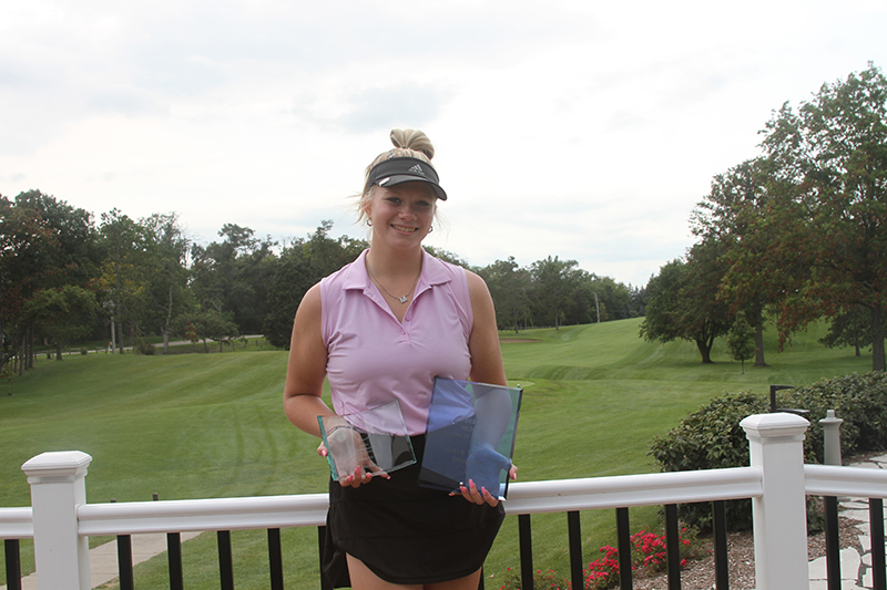 Huntley golfer Maddie Sloan is shown with her McHenry County Jr. Golf Player of the Year and tournament champ awards for girls age 16-18.