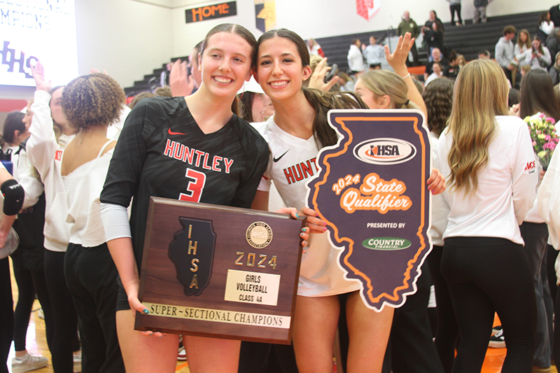 Alex Goritz, left and Diellza Sejdini celebrate after Huntley advanced to the Class 4A State Semifinals by winning the DeKalb super-sectional battle with Fremd.