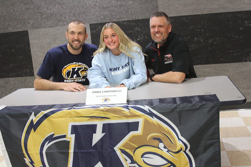 Huntley girls basketball player senior Anna Campanelli signs a letter of intent to attend Kent State University. From left: Red Raiders assistant coach Clay Henricksen, Campanelli and head coach Steve Raethz.