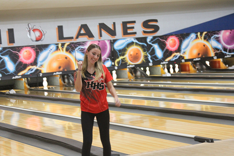 Ashlyn Tenglin of the Red Raiders celebrates a strike in a dual bowling match with Jacobs.