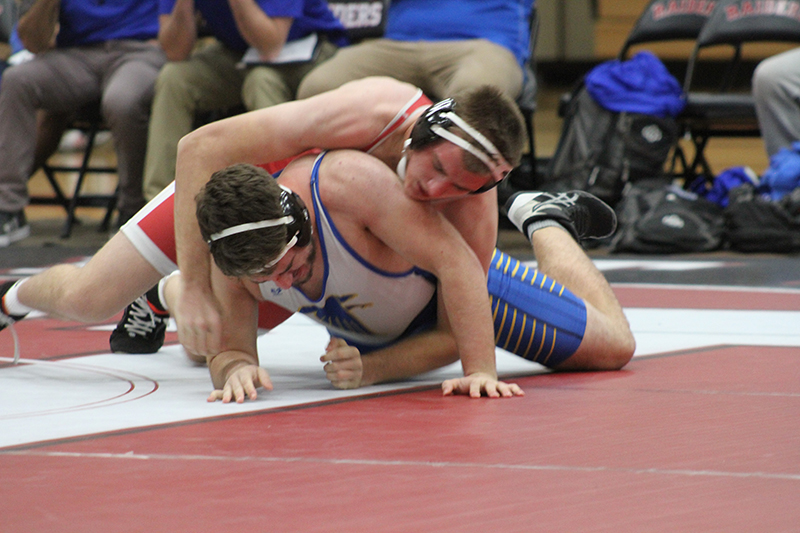 Huntley senior Wyatt Theobald wrestles at 215 pounds during the Red Raiders' mega dual event Dec. 28.