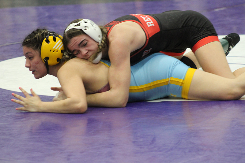 Huntley senior Aubrie Rohrbacher is in charge of the 130 pound title bout against Jessica Perez of Maine West, at the IHSA Hampshire Girls Wrestling Regional Feb. 1.