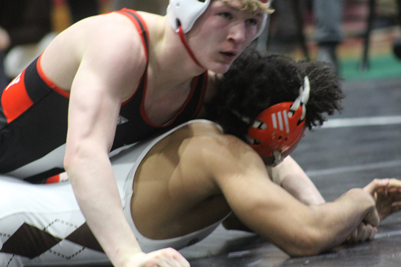 Huntley sophomore Radic Dvorak, top, battles Frank Tagoe of Hersey in the 157 pound championship match at the IHSA Class 3A Barrington Sectional. Dvorak won the match and has qualified for the state tournament.